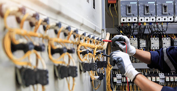 Professional Electrician technician working in Andrews, TX